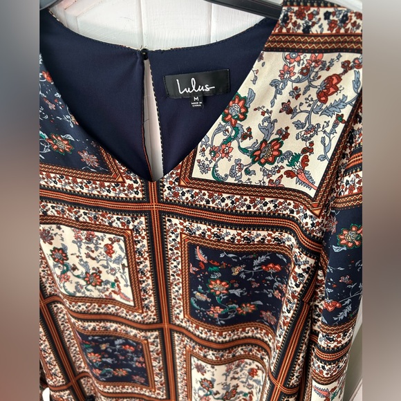 NWOT Lulu's Navy and Cream Lined Pattern Dress w/Bell Sleeves and Ruffle Bottom - Picture 15 of 15